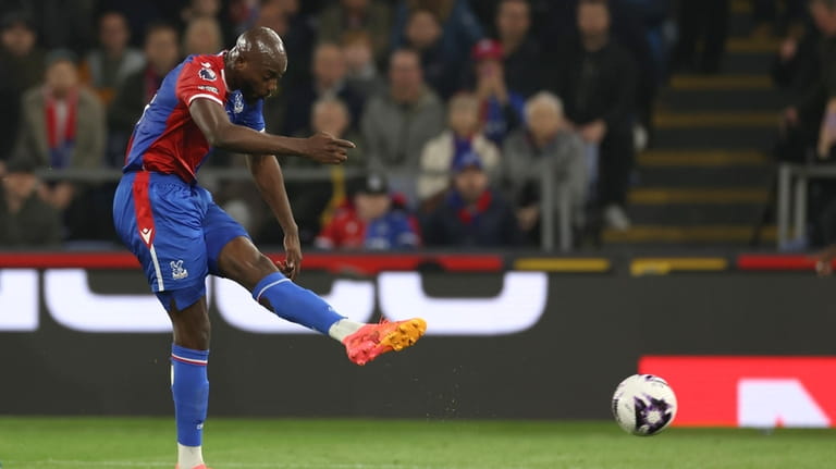 Crystal Palace's Jean-Philippe Mateta scores his side's second goal during...