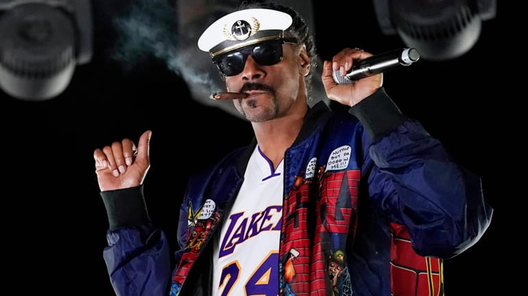 Snoop Dogg performs a DJ set as "DJ Snoopadelic" during...