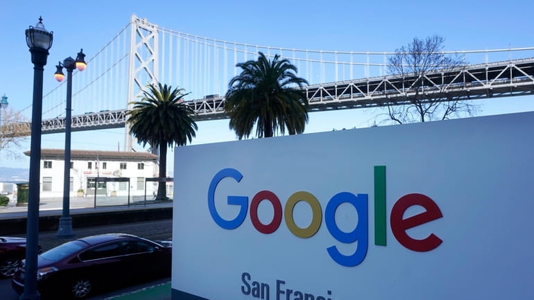 The San Francisco-Oakland Bay Bridge is seen behind a Google...