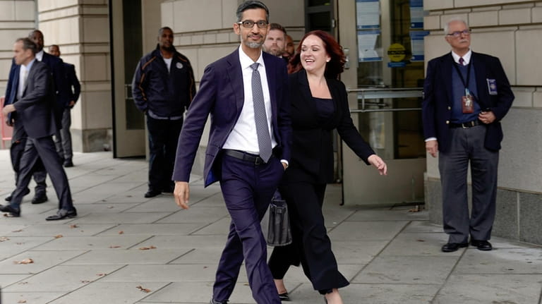 Google CEO Sundar Pichai leaves the federal courthouse on Oct....