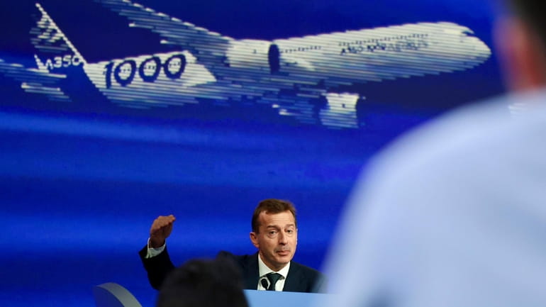 Airbus CEO Guillaume Faury presents the European aerospace giant full...