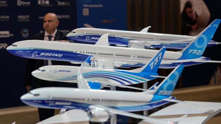 Models of Boeing aircraft are displayed during the Singapore Airshow...