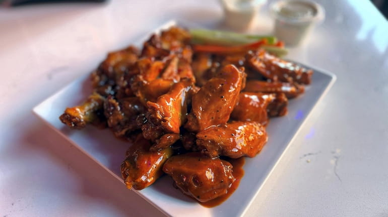 Twisted Wings in Rockville Centre sells 25 flavor varieties, including...