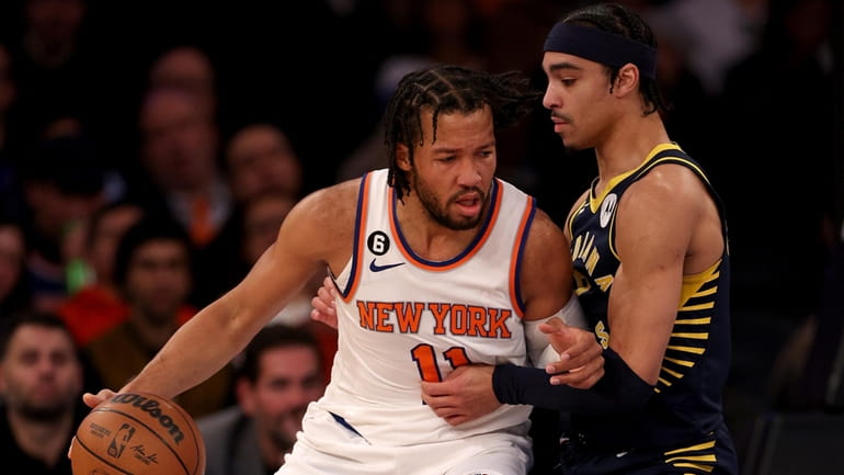 Jalen Brunson #11 of the New York Knicks heads for...