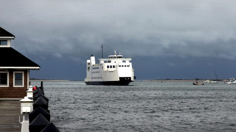 The ferry Grand Republic enters Port Jefferson Harbor after crossing...