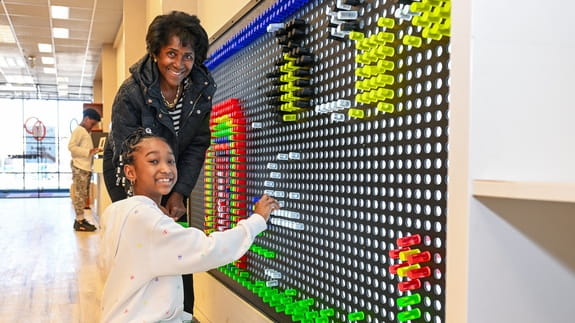 Sharon Terry and granddaughter Giovanna, 8, play with the Pixel Art...