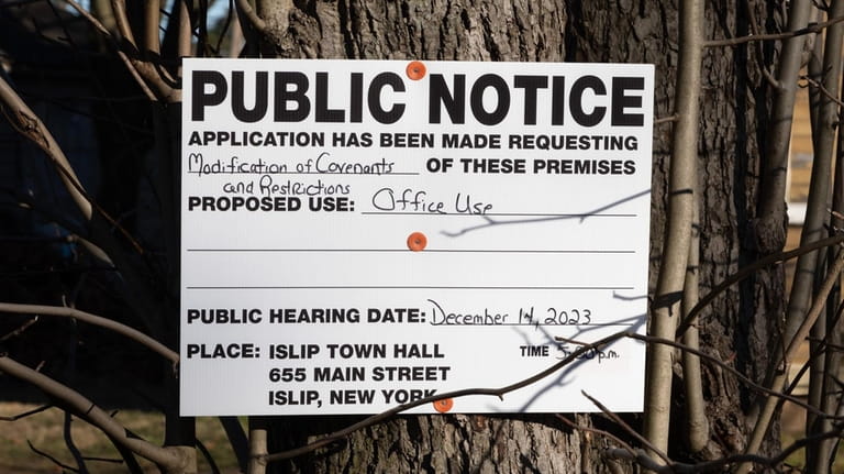 A public notice outside the Shutt House on Dec. 19.