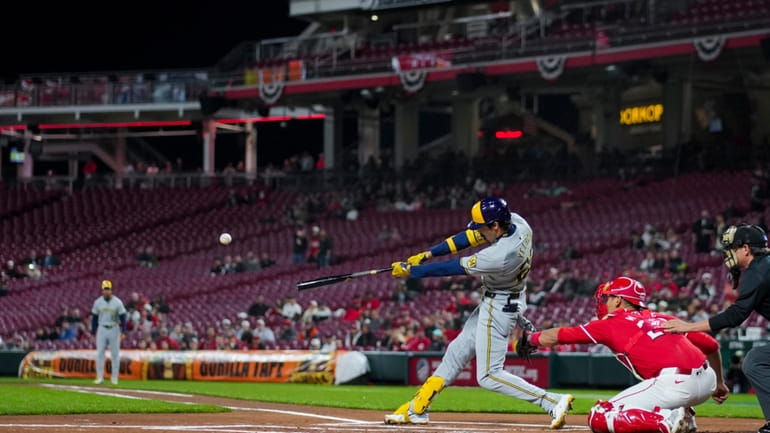 Milwaukee Brewers' Christian Yelich hits a two-run home run during...