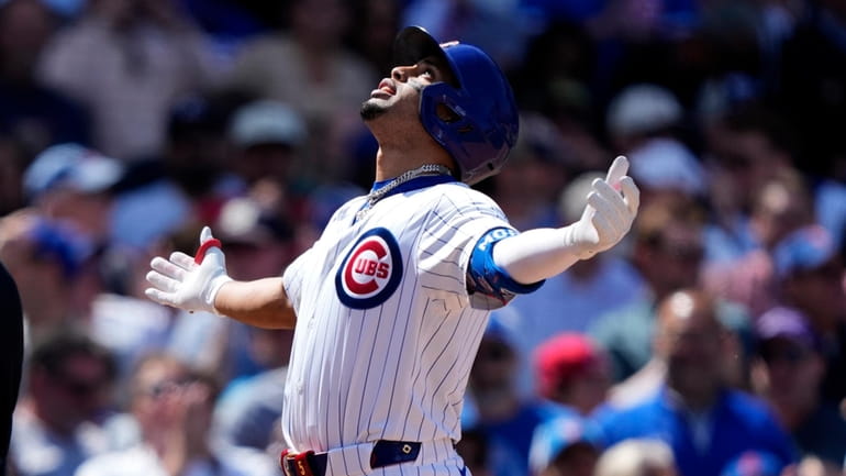 Chicago Cubs' Christopher Morel celebrates his home run off Milwaukee...
