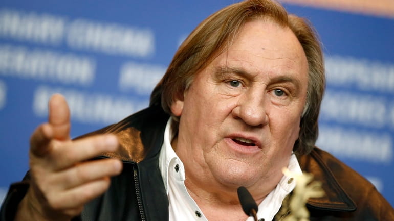 Actor Gerard Depardieu addresses the media during the press conference...