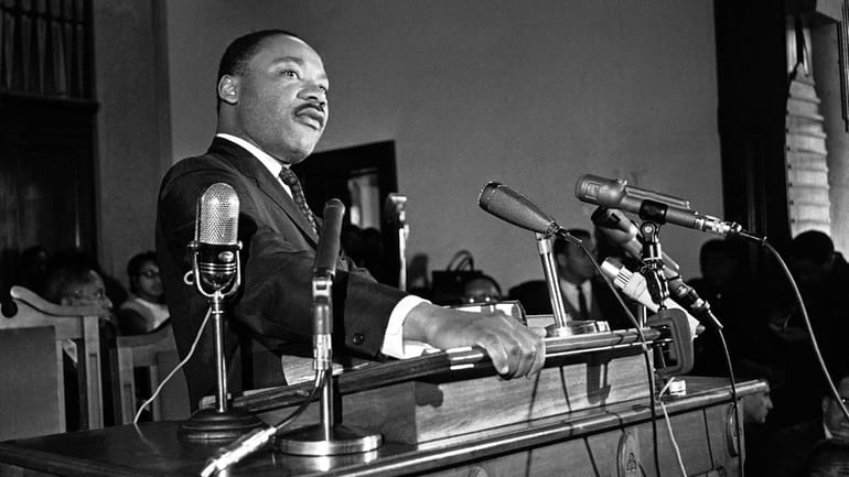 Rev. Martin Luther King Jr. addresses a rally in Selma, Alabama,...