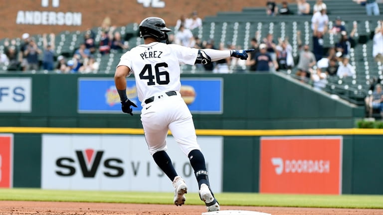 Detroit Tigers' Wenceel Pérez reacts after hitting a two-run home...