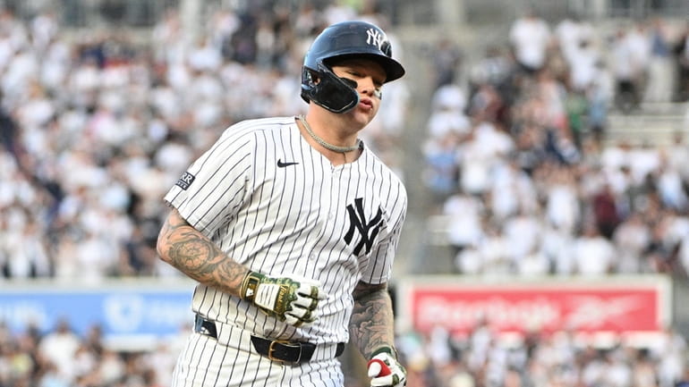 Yankees’ Alex Verdugo rounds the bases on his three-run home...