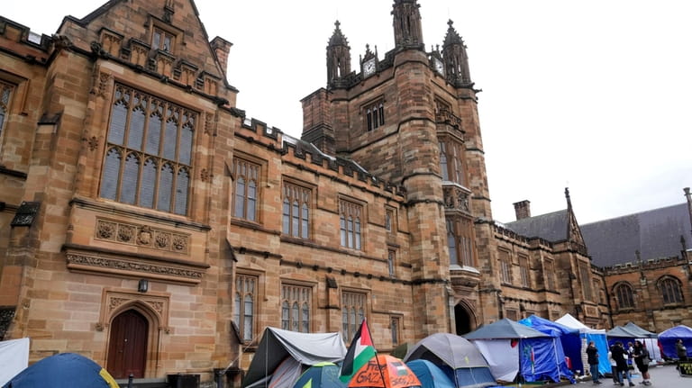 Protesting students occupy an area of the quadrangle at the...