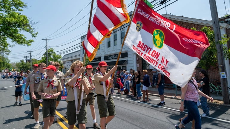 Boy Scouts march in last year's Babylon Memorial Day Parade....
