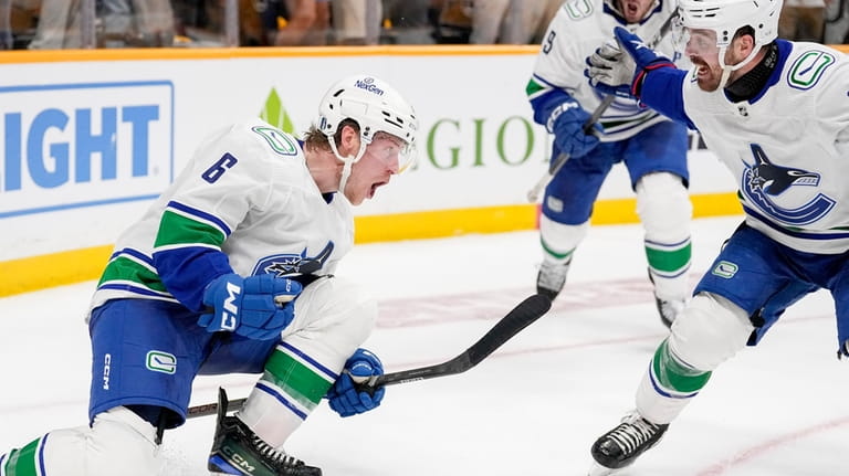 Vancouver Canucks right wing Brock Boeser (6) celebrates his game...