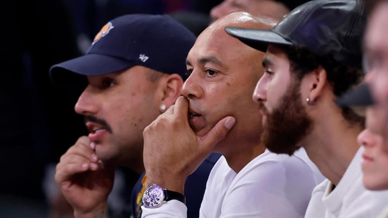 Yankees lefthander Nestor Cortes, left, and former closer Mariano Rivera watch Game...