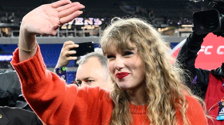 Taylor Swift waves after the AFC Championship NFL football game...