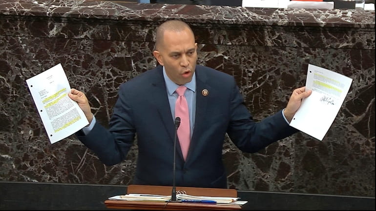 In this image from video, House impeachment manager Rep. Hakeem...