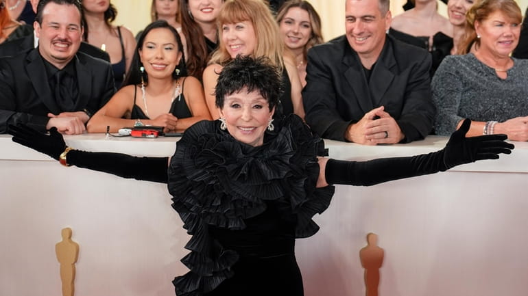 Rita Moreno arrives at the Oscars on Sunday, March 10,...