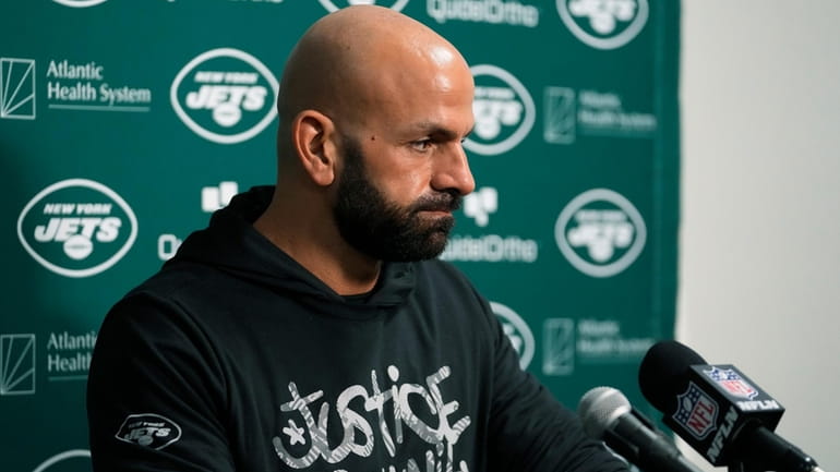Jets head coach Robert Saleh listens to a question during...