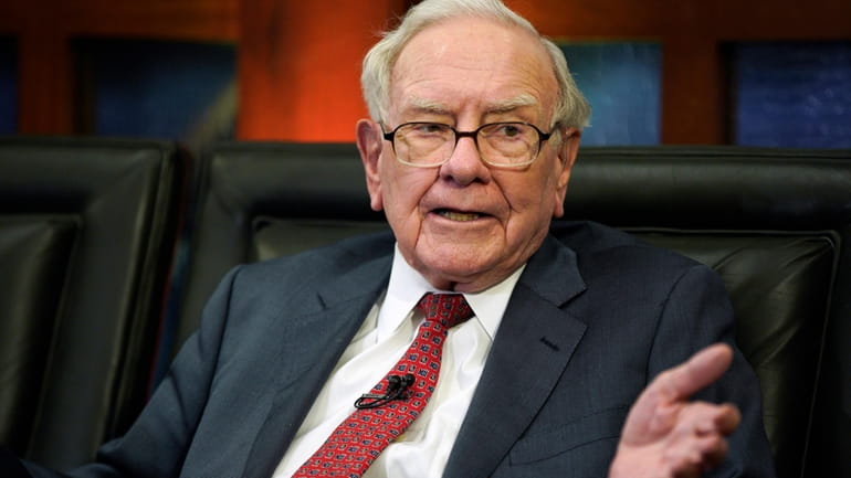 Berkshire Hathaway Chairman and CEO Warren Buffett speaks during an...