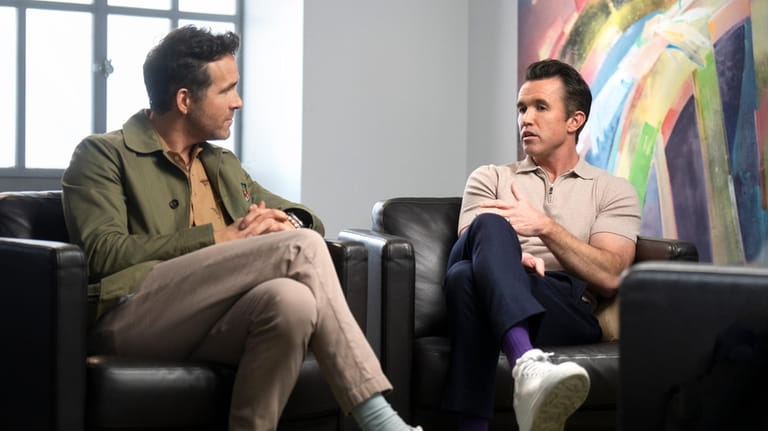 This image released by FX shows Ryan Reynolds, left, and...