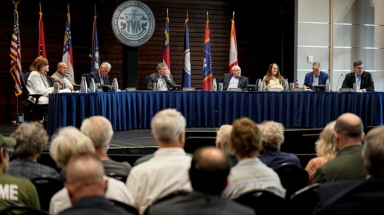 Members of the Tennessee Valley Authority Board of Directors listen...