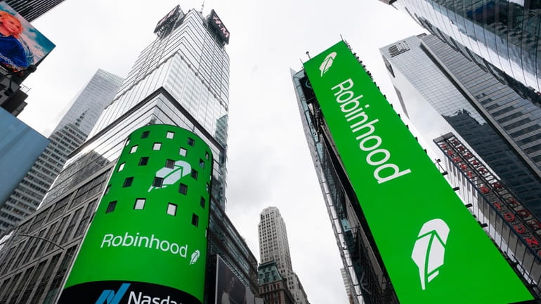 Electronic screens in New York's Times Square announce the Robinhood...