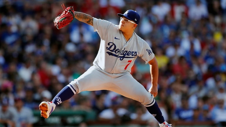 Los Angeles Dodgers starting pitcher Julio Urias pitches during the...