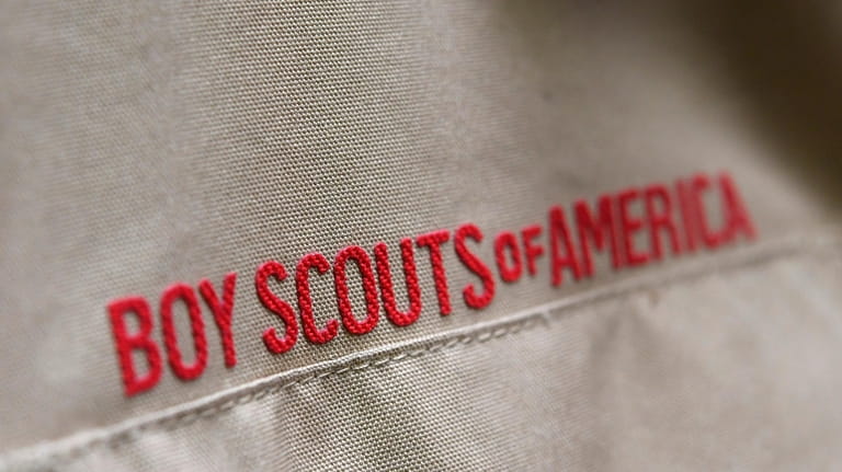 A Boy Scout uniform is displayed, Feb. 18, 2020, in...
