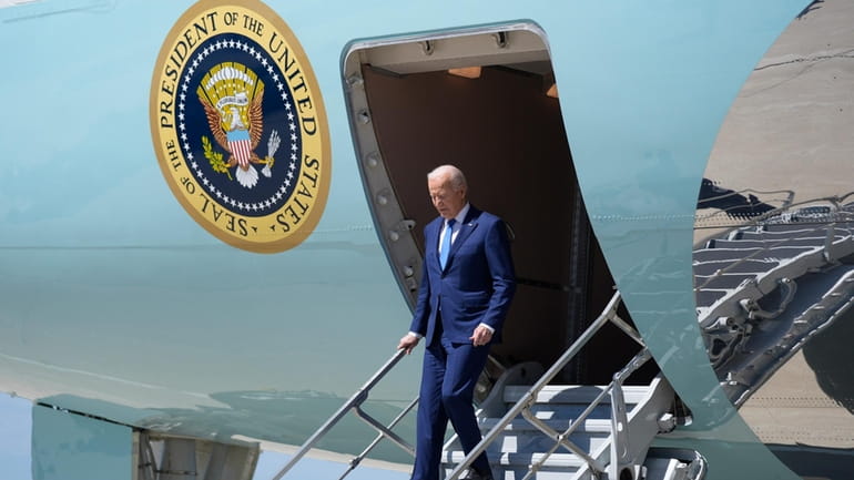 President Joe Biden arrives at Milwaukee Mitchell International Airport, Wednesday,...