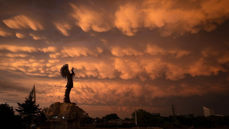 A formation of Mammatus clouds fills the sky over Wichita,...