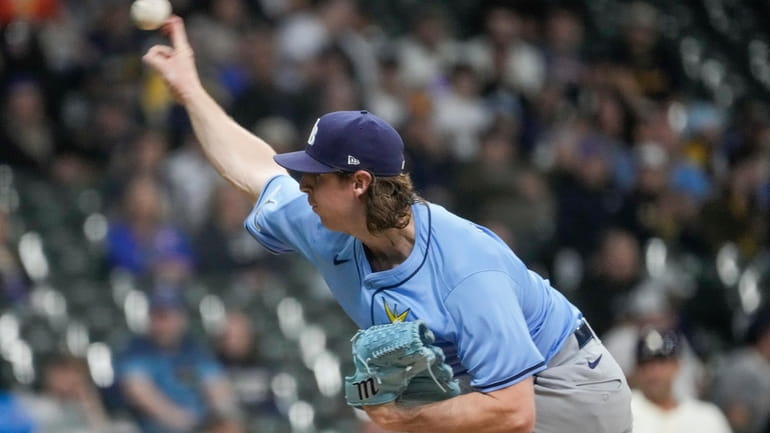 Tampa Bay Rays pitcher Ryan Pepiot throws during the first...