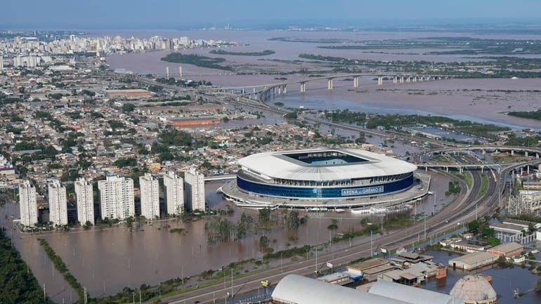 The Gremio Arena and surrounding area are flooded after heavy...