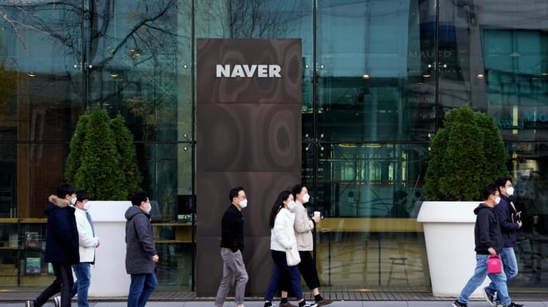 The logo of Naver is seen at its headquarters in...