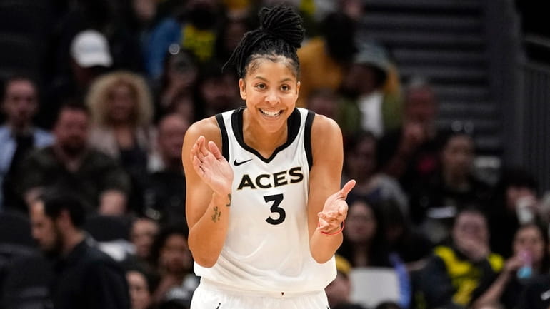 Las Vegas Aces forward Candace Parker reacts during the first...