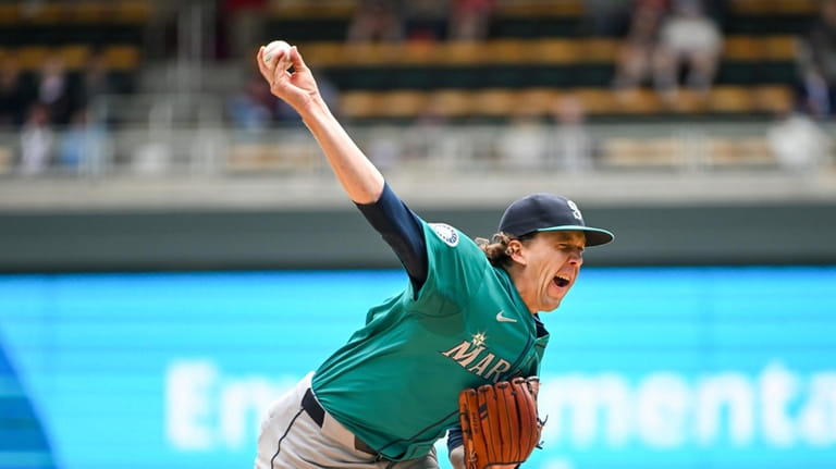 Seattle Mariners Logan Gilbert throws against the Minnesota Twins during...