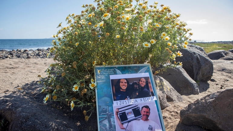 The photos of the foreign surfers who disappeared are placed...