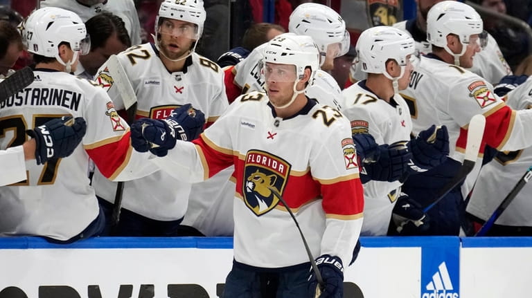 Florida Panthers center Carter Verhaeghe (23) celebrates with the bench...