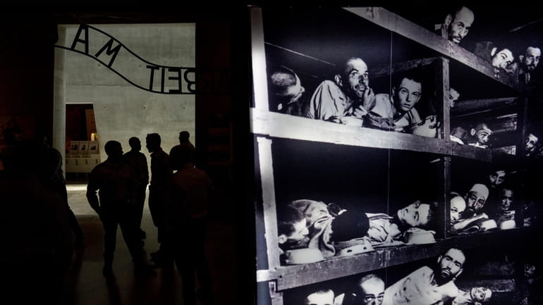 People visit the Yad Vashem Holocaust Memorial Museum in Jerusalem,...