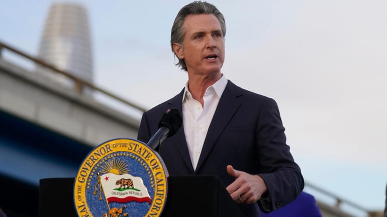 FILE – California Gov. Gavin Newsom speaks during an event...