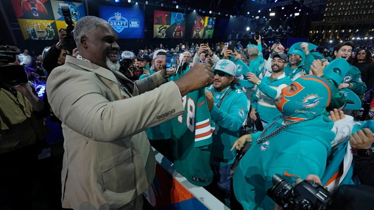 Former player Richmond Webb meets with Miami Dolphins fans during...