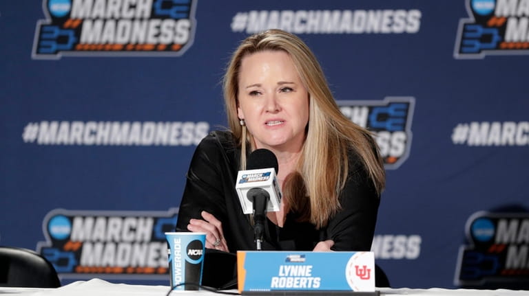 Utah women's head coach Lynne Roberts speaks during a press...