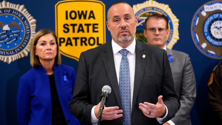 Iowa Dept. of Public Safety Commissioner Stephan Bayens speaks during...