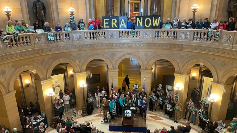 Dozens of supporters of the proposed Minnesota Equal Rights Amendment...