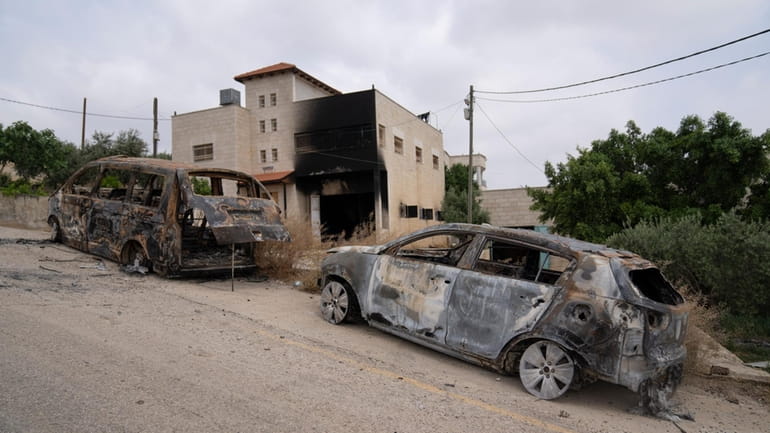 House and vehicles of Ibrahim Dawabsha and his family that...