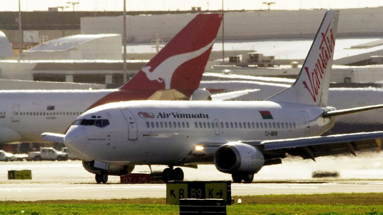 An Air Vanuatu plane makes an emergency landing at Sydney...