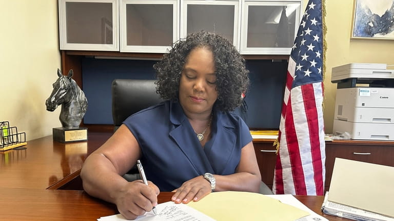 Louisiana Democratic state Rep. Delisha Boyd works at her desk...
