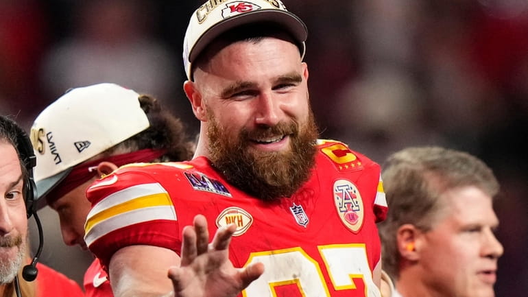 Kansas City Chiefs tight end Travis Kelce (87) waves after...